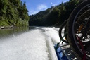 Jet boat and bikes returning from the Bridge to Nowhere