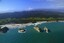 Wharariki Beach and Puponga Farm Park in behind.