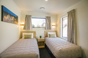 third room with 2 single beds