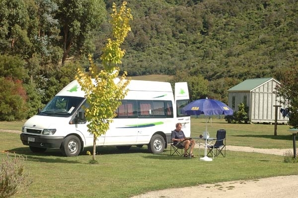 Relax in a spacious campervan site and listen to the birds sing!